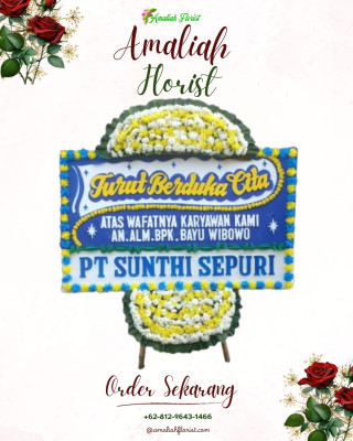 Papan Bunga Duka di Ujung Bulu